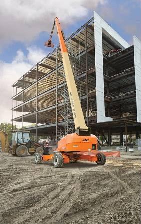 Boom lift operating on a construction site